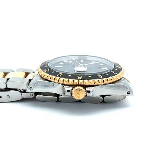 601 - 1991 Rolex GMT Oyster Perpetual wristwatch, 18k gold & steel, spare link included, complete with box... 