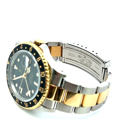 601 - 1991 Rolex GMT Oyster Perpetual wristwatch, 18k gold & steel, spare link included, complete with box... 