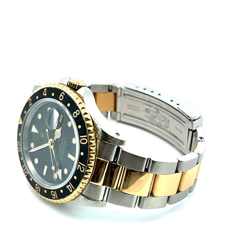 601 - 1991 Rolex GMT Oyster Perpetual wristwatch, 18k gold & steel, spare link included, complete with box... 