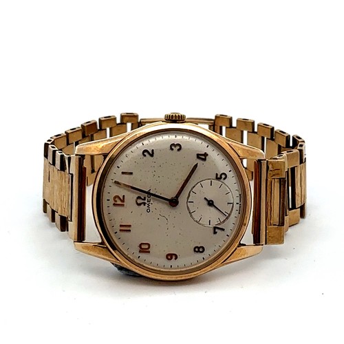 635 - Gents 1964 9ct gold Omega wristwatch with original box, guarantee booklet and purchase papers. Inscr... 