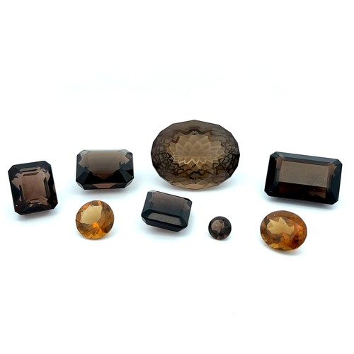 524 - Some loose unmounted smoky quartz gemstones. Total  weight 114.7ct. Largest stone 46.9ct