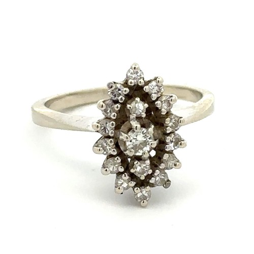 462 - Diamond ring - round brilliant diamonds set in a marquise design in white gold, tests as 18ct. Appro... 