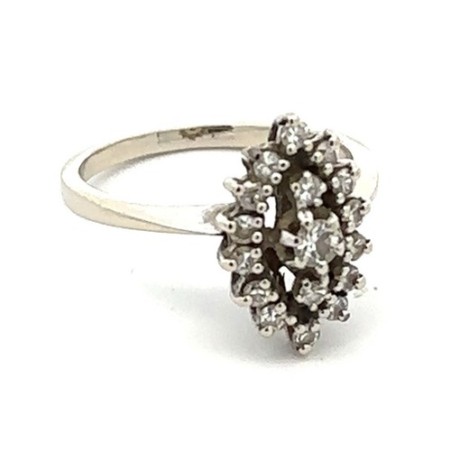 462 - Diamond ring - round brilliant diamonds set in a marquise design in white gold, tests as 18ct. Appro... 