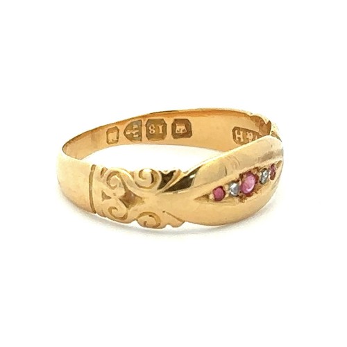 431 - A late Victorian 18ct gold ring with scroll shoulders set with five stones, rubies and diamonds, Che... 