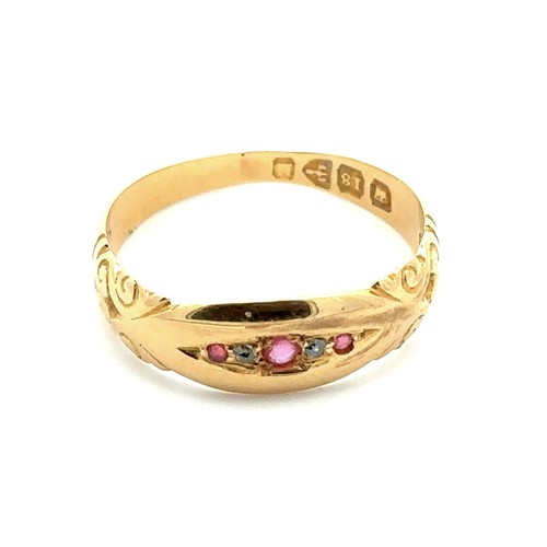 431 - A late Victorian 18ct gold ring with scroll shoulders set with five stones, rubies and diamonds, Che... 