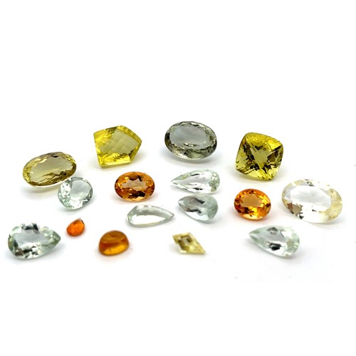 526 - A number of loose unmounted quartz gemstones including citrine and prasiolite. Some fancy cut. Total... 