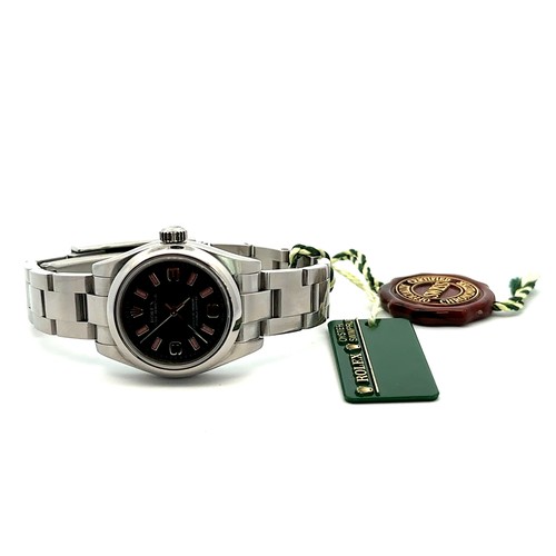 588 - 2009 Rolex Oyster Perpetual wristwatch, steel, rare Black Dial and pinl batons, Original box, bookle... 