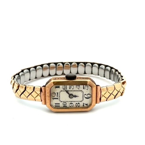 644 - A 9ct gold ladies wristwatch. Bracelet is marked 