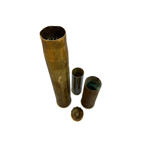 206 - Four pieces of Ammunition Shell cases in varying sizes, one large shell height 67.5cm, two mid-size ... 