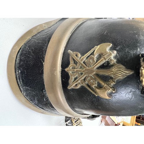 39 - A 19th Century Victorian leather and brass fireman's / fire helmet, Volunteer helmet. Sturdy black l... 