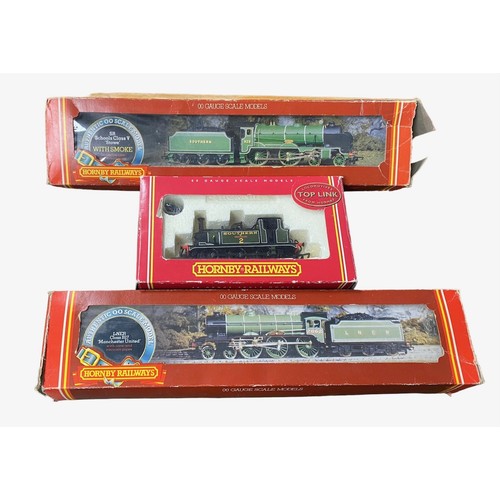 157 - Hornby. Trio of locomotives, generally excellent in good or better boxes, with LNER green 2862 Manch... 