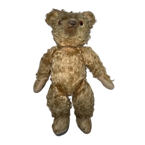 248 - A post-war Chad Valley teddy bear with light curly fur orange and black eyes, jointed limbs and squa... 