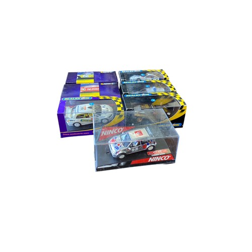 228 - Scalextric. 2000s onwards 1/32nd scale slot car collection, generally excellent in good or better bo... 