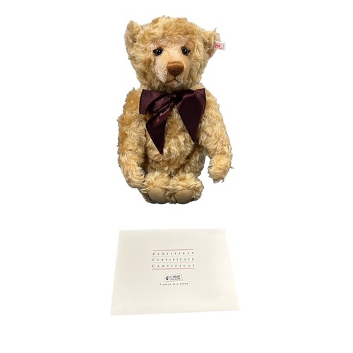 280 - Steiff. Millennium Teddy Bear, white tag no. 670374, limited edition certificate no. 8556 and produc... 