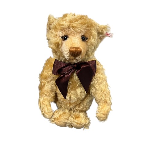 280 - Steiff. Millennium Teddy Bear, white tag no. 670374, limited edition certificate no. 8556 and produc... 