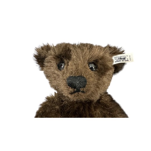 301 - Steiff. 1991 replica of 1908 Muzzle Bear, white tag No.  406119, dark brown mohair, tan leather muzz... 