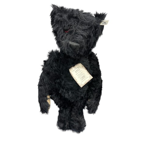 303 - Steiff. 1991 replica of 1912 Teddy black, white tag No. 406829, excellent in good plus box with poor... 