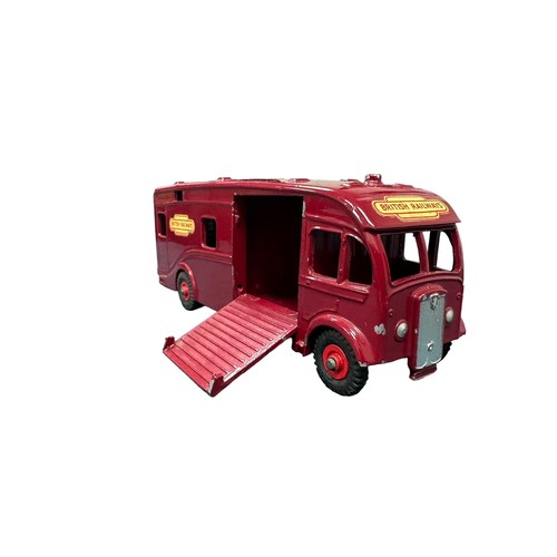 68 - Dinky. Horse Box No.981, generally excellent in good plus blue and white striped lift-off lid box (s... 