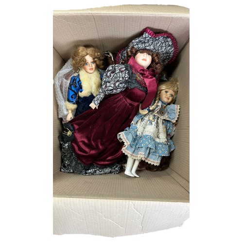 243 - Modern issue unboxed collection of mostly porcelain dolls by Leonardo, many on stands, generally goo... 