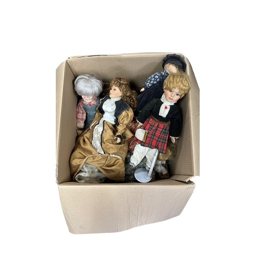 243 - Modern issue unboxed collection of mostly porcelain dolls by Leonardo, many on stands, generally goo... 