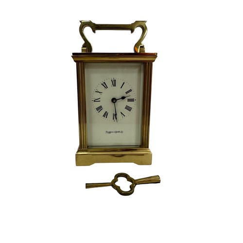 133 - A brass Mappin & Webb carriage clock,15cm high. Clock is running at time of cataloguing.