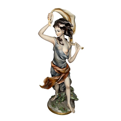 283 - A Joseph Barbetta Capodimonte Italian Flavia figurine of a partially nude woman. Signed ‘Barbetta’ t... 