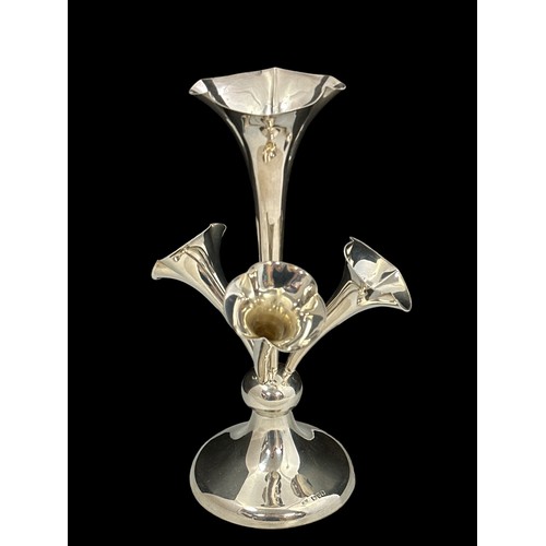 186 - A sterling silver epergne by Jones and Crompton, with plain circular base, one large and 3 smaller d... 