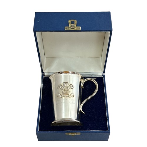 188 - A Barker Ellis tankard with scroll handle. Commemorating the marriage of Charles and Diana and embos... 