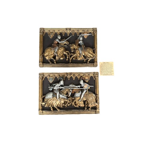 340 - A pair of Marcus Designs hall plaques of jousting/fighting knights, both 22cm by 32cm.