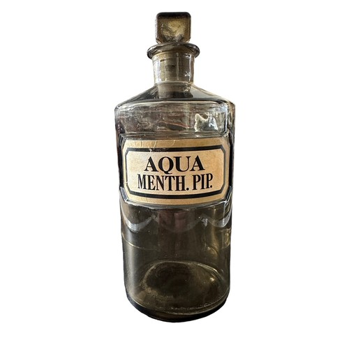 282 - Range of four chemists bottles with ground glass stoppers including clear bottle with 