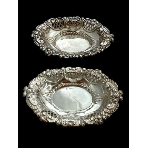 197 - Two bon bon dishes with a filigree design, by Nathan and Hayes, 1898 Chester hallmarks. Weight 67g.