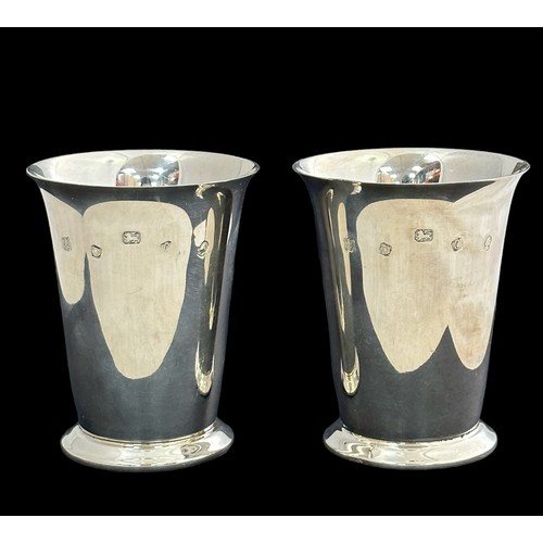 205 - A silver  pair of cups by Barker Ellis. 8cm in height. Fully hallmarked. Weight 151g in total.