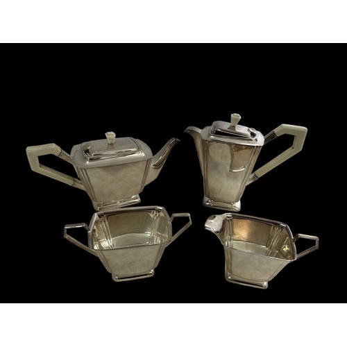 191 - A silver plated Art Deco style four piece tea and coffee service with stylised design. Comprising of... 