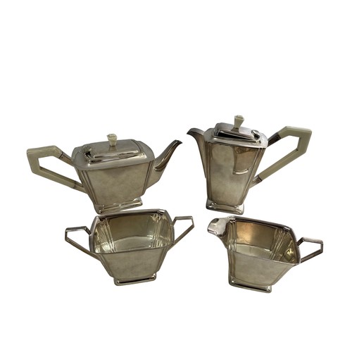 191 - A silver plated Art Deco style four piece tea and coffee service with stylised design. Comprising of... 