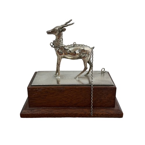 330 - An attractive desk ornament with a white metal deer figure on wooden base.