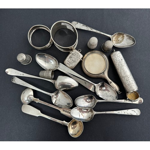 203 - A range of sterling silver items including 2 napkin rings, one dented, 4 thimbles, vanity mirror, 3 ... 