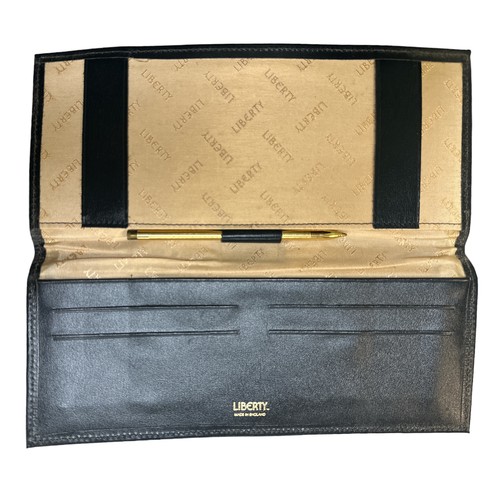 328 - A Liberty ladies wallet / cheque book holder with pen with a clutch bag hand made in Belgium. Qty 2