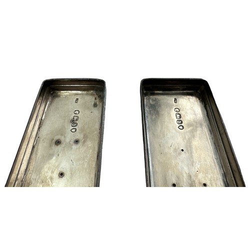 211 - Pair of dressing table silver lidded boxes, 12.5cm and 18cm in length. Qty 2