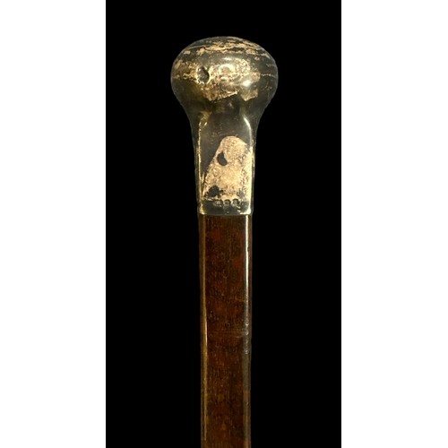 154 - Walking stick with hallmarked silver top.