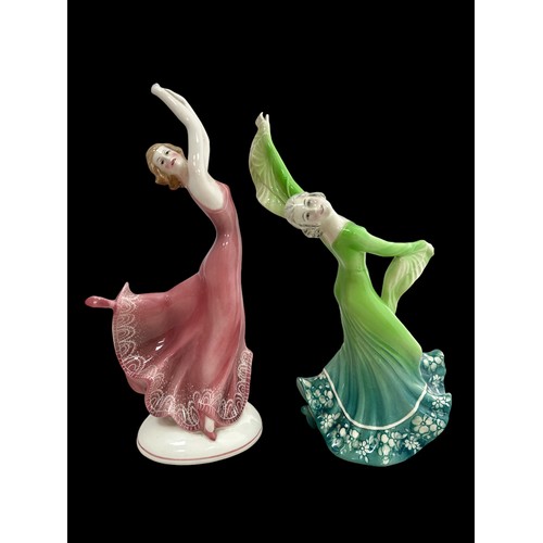 370 - Two Katzhutte porcelain dancing figurines. Dancer in a green dress, 26cm high, small chip on back fo... 