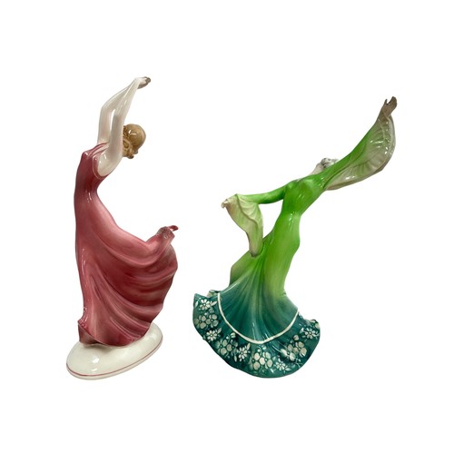 370 - Two Katzhutte porcelain dancing figurines. Dancer in a green dress, 26cm high, small chip on back fo... 