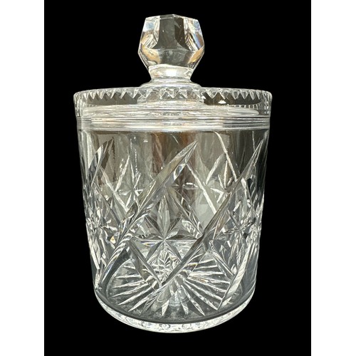 393 - A cut glass biscuit barrel approx 17cm high along with two cut glass jam pots, a crystal bell  and a... 