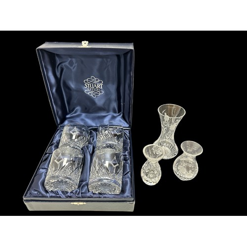 395 - A cased set of four Stuart Crystal tumblers and two Stuart Crystal Cascade flower vases and a furthe... 