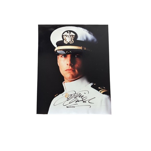 267 - Tom Cruise (b. 1962) – Top Gun, unframed signed colour photograph of Tom Cruise in white pilot unifo... 