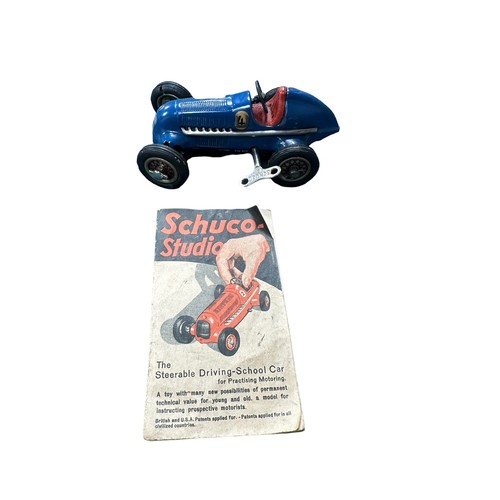 476 - Schuco Studio Racing Car working clockwork with key steerable car, blue, race no. 4, with Driving Sc... 