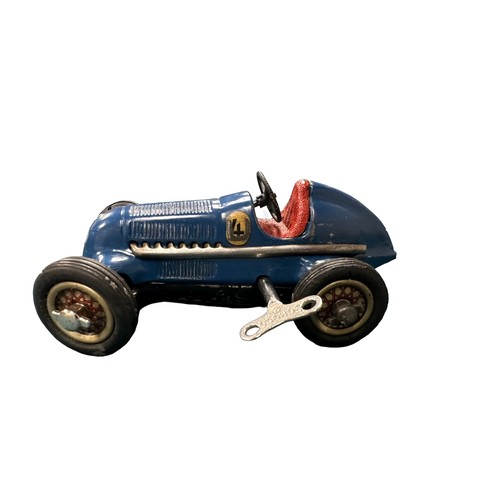 476 - Schuco Studio Racing Car working clockwork with key steerable car, blue, race no. 4, with Driving Sc... 