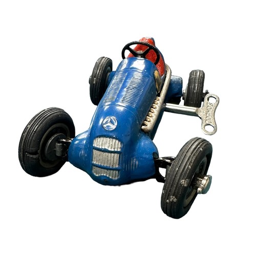 476 - Schuco Studio Racing Car working clockwork with key steerable car, blue, race no. 4, with Driving Sc... 