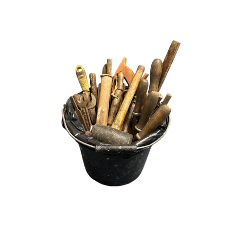 125 - Bucket of hand tools. Approx 45 hand tools in a metal handled plastic bucket. Includes a saw, chisel... 