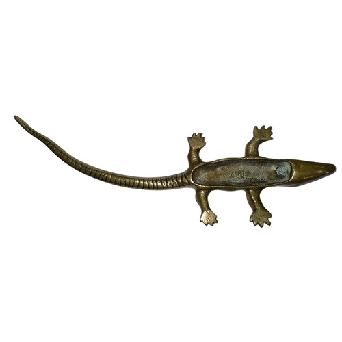 291 - Small brass crocodile stamped 19459 to base. Measures 25cm in length.