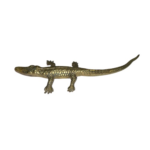 291 - Small brass crocodile stamped 19459 to base. Measures 25cm in length.